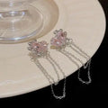 Pink Ballroom Earrings - These Exquisite Statement Hoops featuring delicate pink heart-shaped stones with silver chains hanging elegantly, perfect for stylish statement jewelry looks.