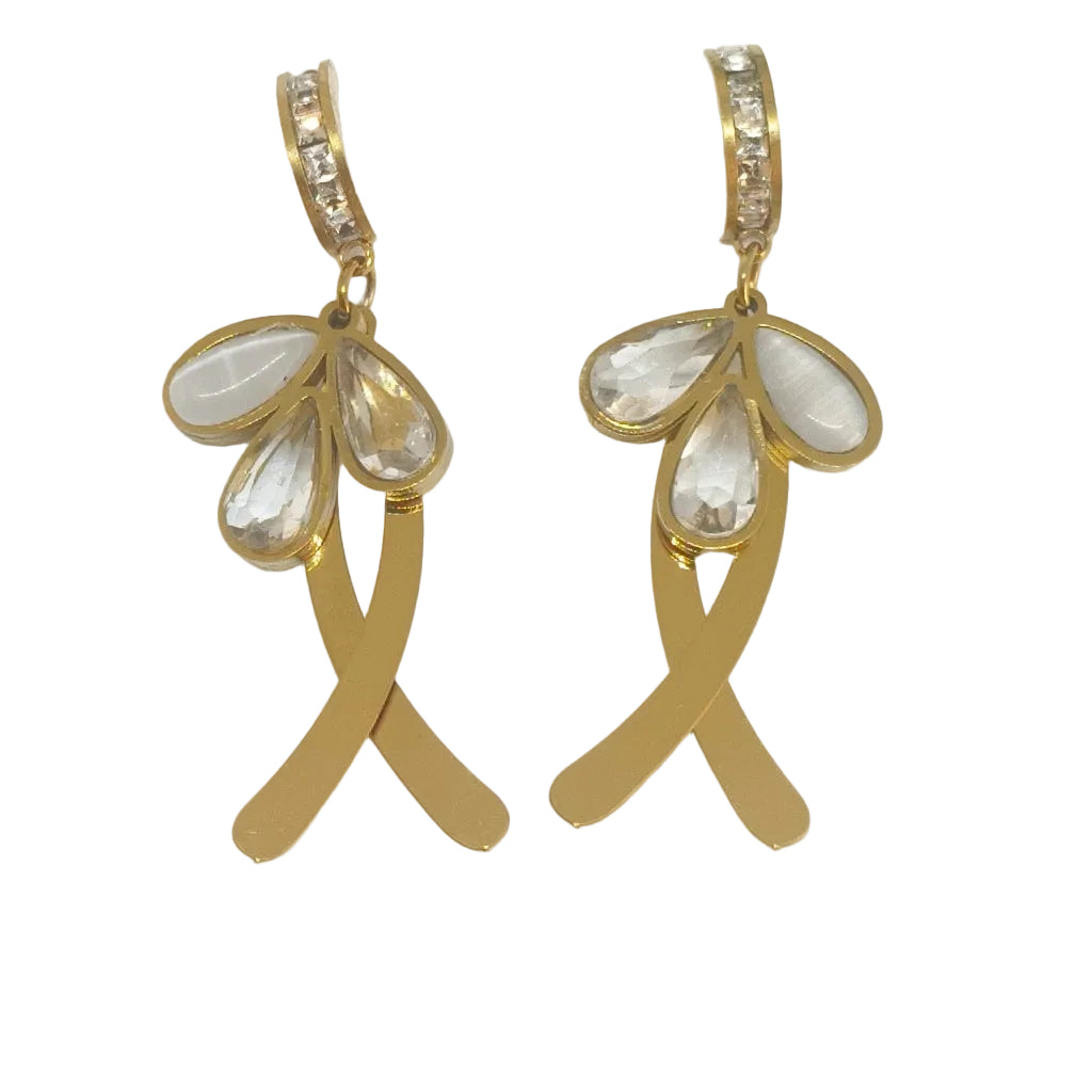 A pair of gold drop earrings with clear teardrop-shaped rhinestones and a curved gold bar with small clear stones at the top, displayed on a white card against a white background.