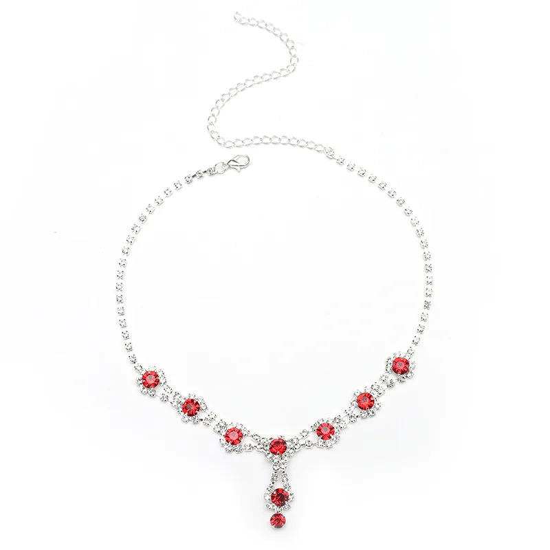 Necklace with red gemstones on a white background