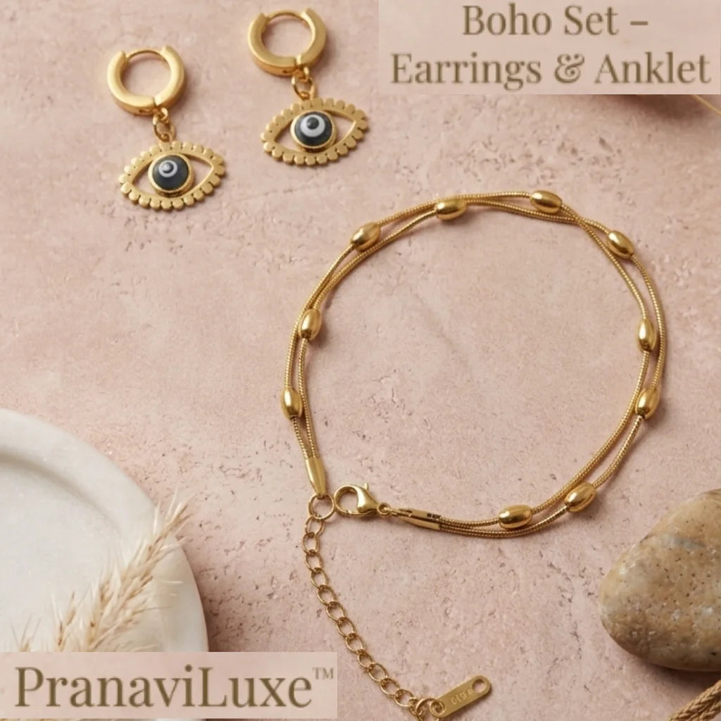 Gold-tone jewelry set including a beaded chain necklace and matching hoop earrings with evil eye charms
