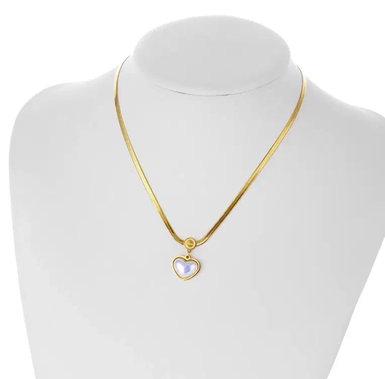 Elegant gold chain necklace featuring a delicate love heart shaped pearl pendant necklace, perfect as a stylish fashion jewelry gift for women.
