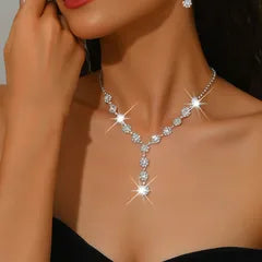 Elegant diamond necklace on a model against a neutral background