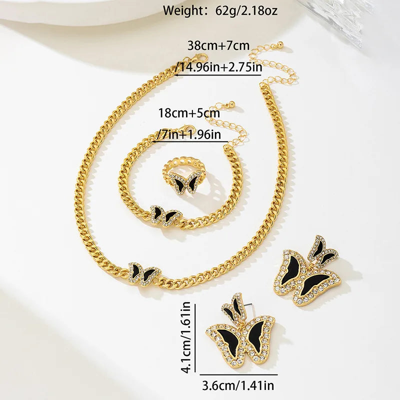 Gold jewelry set with butterfly earrings, necklace, and ring on a white background with measurements.