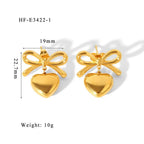 The Season of Bow Earrings stainless steel in polished gold tone featuring bow-shaped studs with dangling heart charms, lightweight and elegant fashion jewelry.