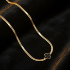 Black Clover Snake Chain Necklace on Dark Velvet