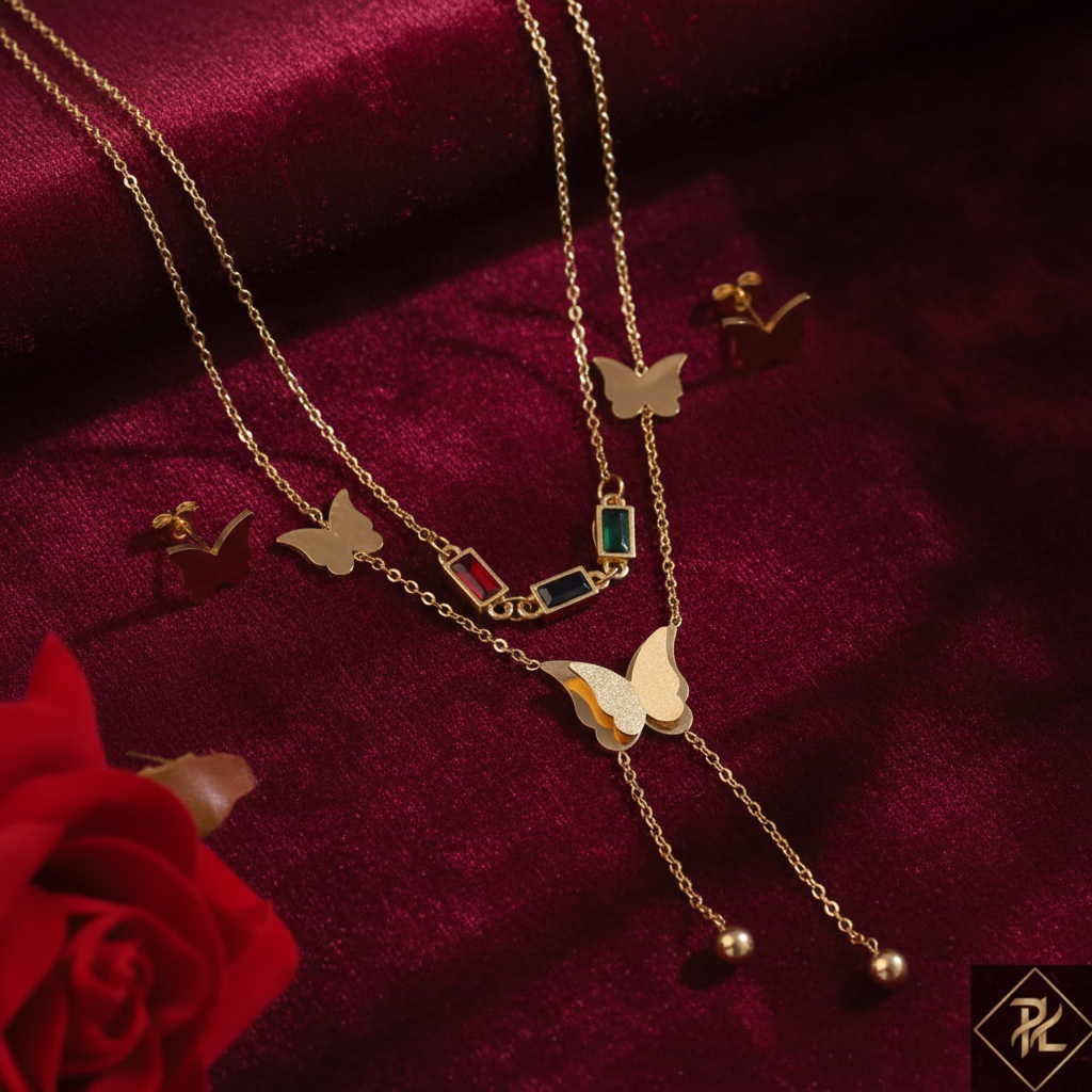 Gold Butterfly Jewelry Set on Dark Velvet