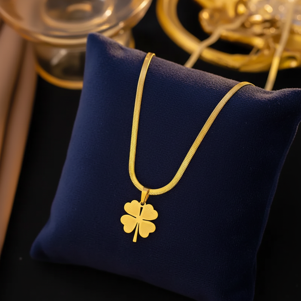 Gold Clover Necklace on Dark Velvet