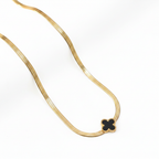 Gold Herringbone Black Clover Necklace - White Background