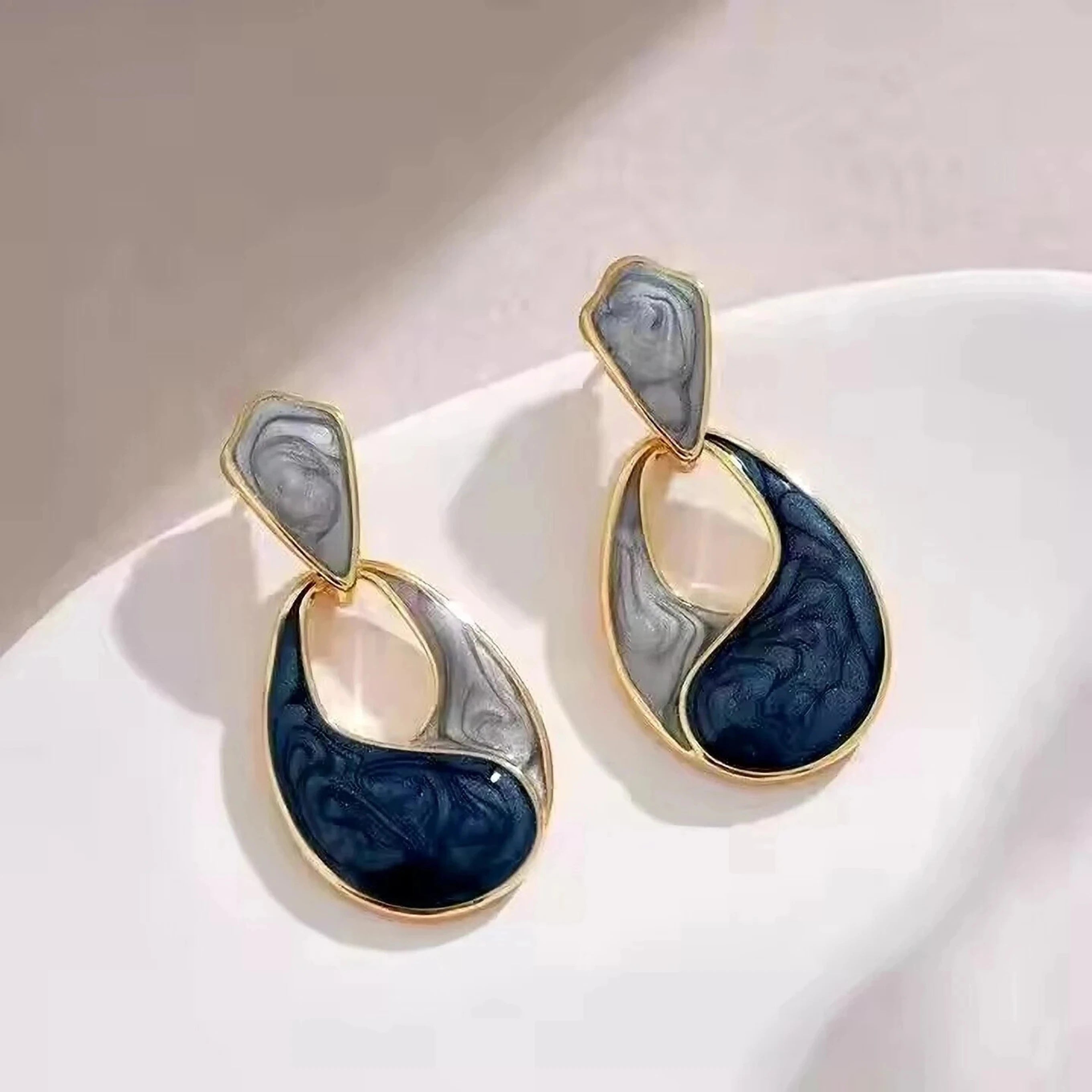 Waterdrop Earrings Stainless Steel featuring a modern teardrop design with elegant black and gray swirled resin in gold-toned metal, perfect for stylish daily wear.