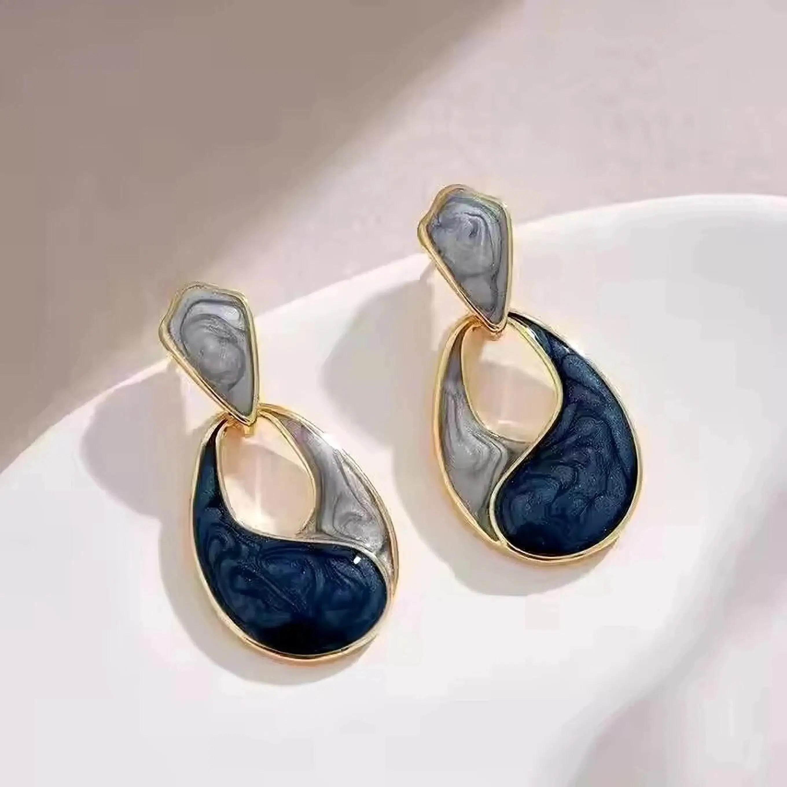 Waterdrop Earrings Stainless Steel featuring a modern teardrop design with elegant black and gray swirled resin in gold-toned metal, perfect for stylish daily wear.