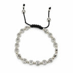 A silver beaded bracelet with circular sun motifs and a black adjustable cord closure, shown on a plain white background.