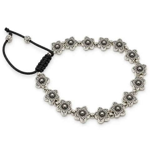 A silver-toned beaded bracelet featuring a series of small flower-shaped beads connected by small round beads, with a black adjustable cord closure on a white background.