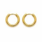 A pair of polished gold huggie hoop earrings on a clean white background.