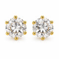 A pair of round-cut diamond stud earrings in a six-prong yellow gold setting, shown on a clean white background.