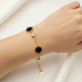 LOVE" Engraved Black Onyx & CZ Bezel Station Love Bracelet